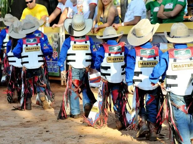 Riders wearing Master Saddles vests